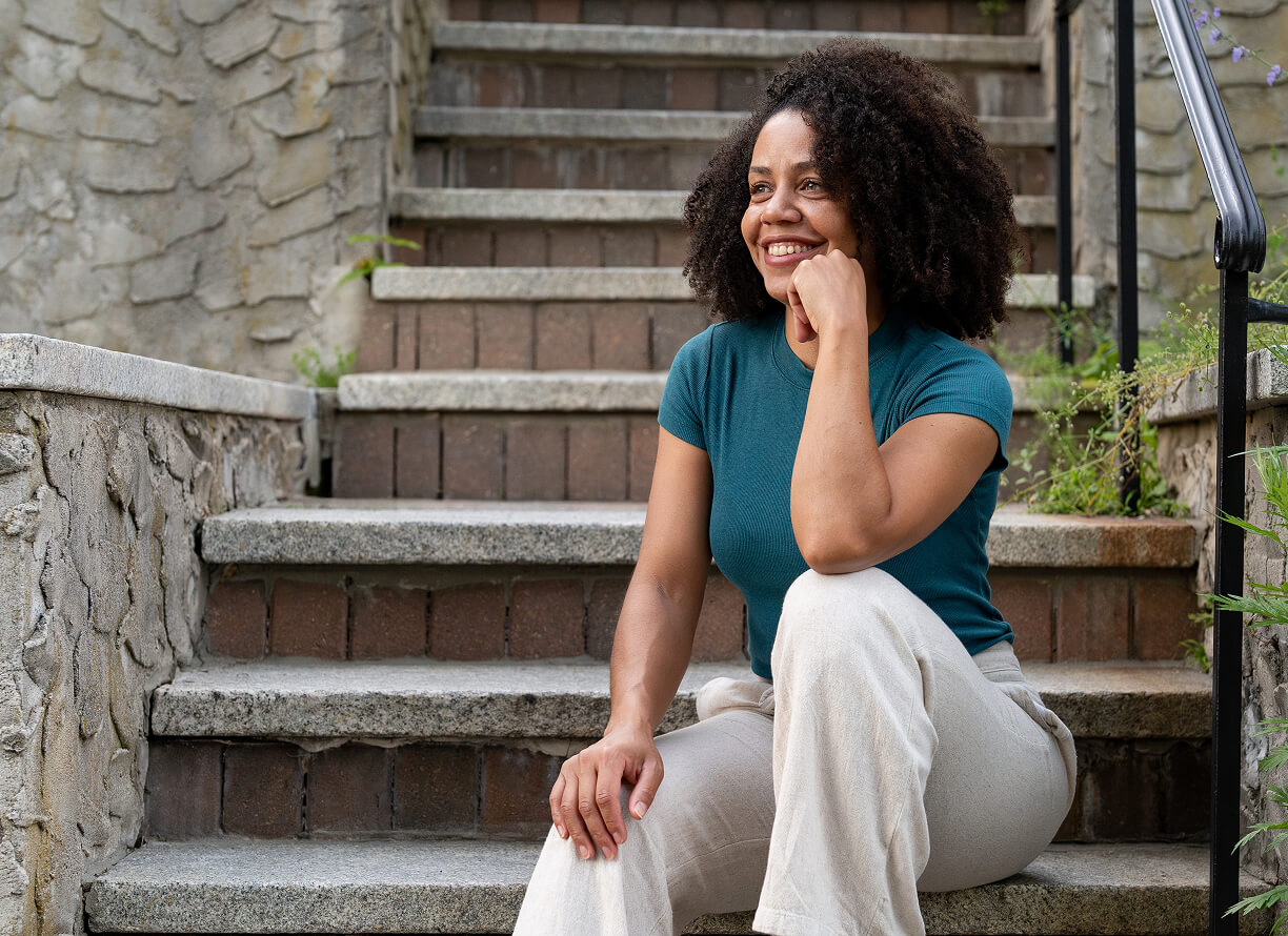 Two women walking a dog, happy after a uterine fibroid embolization procedure